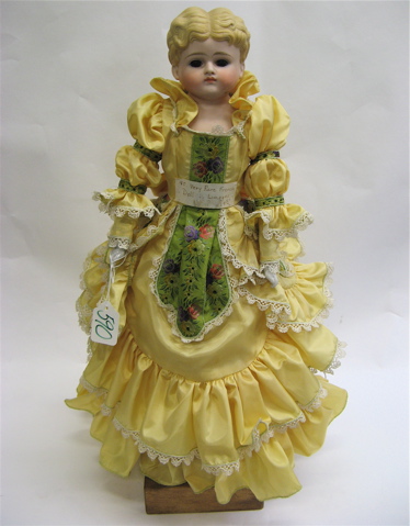 Appraisal: GERMAN BISQUE HEAD GIRL DOLL china head style having molded