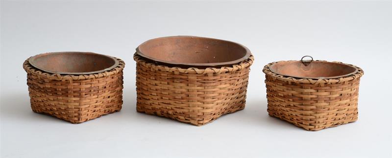 Appraisal: GROUP OF THREE WOVEN LOW BASKETS With copper liners one