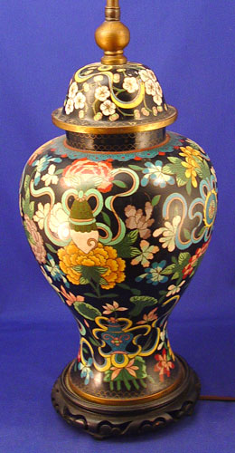 Appraisal: CHINESE CLOISONNE LAMP Black ground with multi color decor Converted