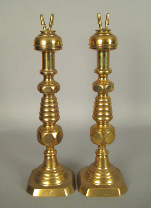 Appraisal: Pair of English brass coronation candlesticks with whale oil lamp