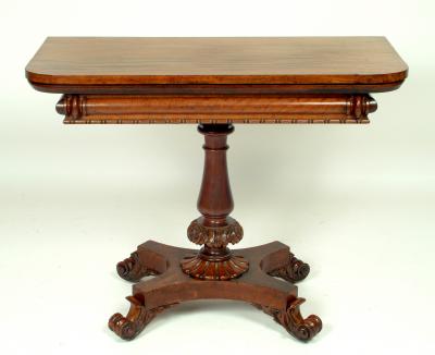 Appraisal: A VICTORIAN MAHOGANY FOLDING TEA TABLE of rounded oblong form