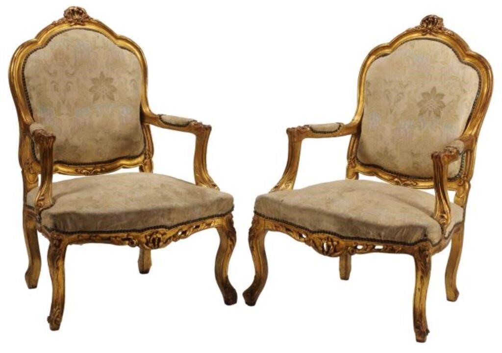 Appraisal: pair Louis XV style giltwood armchairs approx h w d