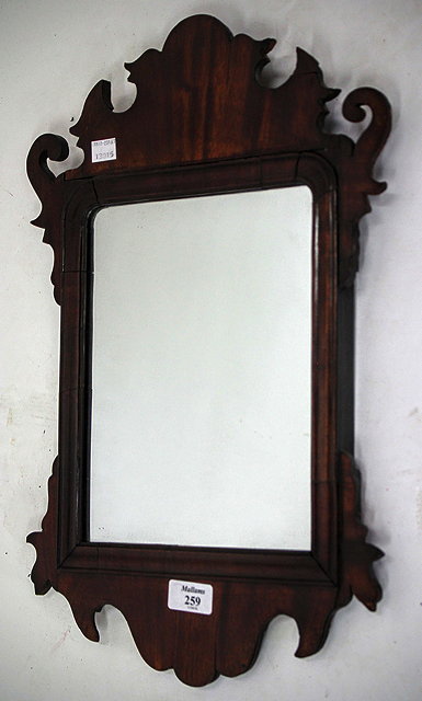 Appraisal: A GEORGIAN SMALL SIZED MAHOGANY FRET FRAMED RECTANGULAR WALL MIRROR