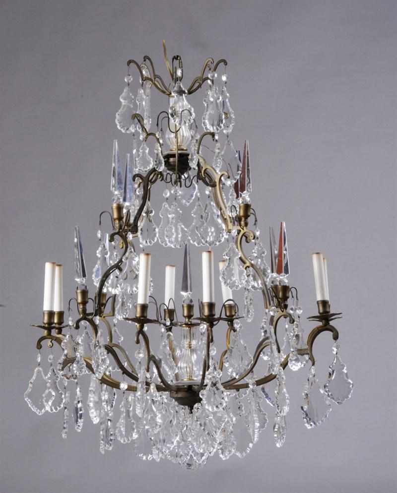 Appraisal: LOUIS XV STYLE CUT-GLASS MOUNTED GILT-METAL EIGHT-LIGHT CHANDELIER The pear-form