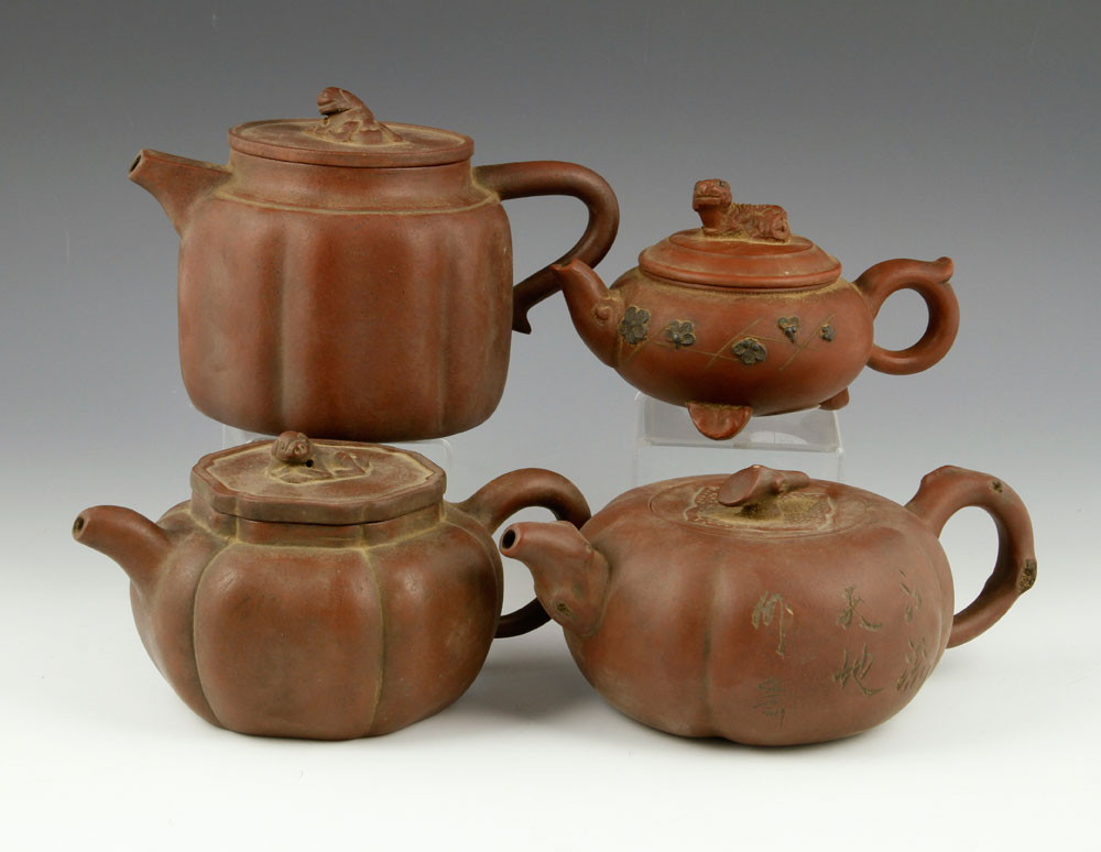 Appraisal: - Four Chinese Yixing Teapots Lot of four Chinese Yixing