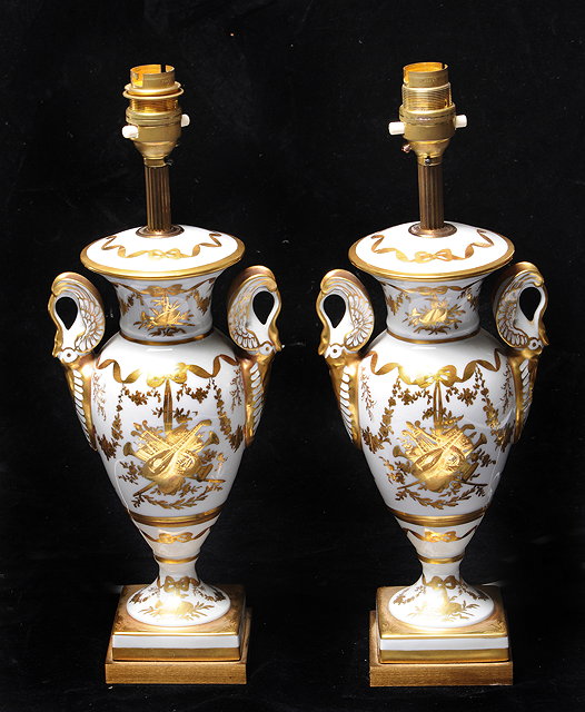 Appraisal: A PAIR OF PORCELAIN TABLE LAMPS of baluster form with