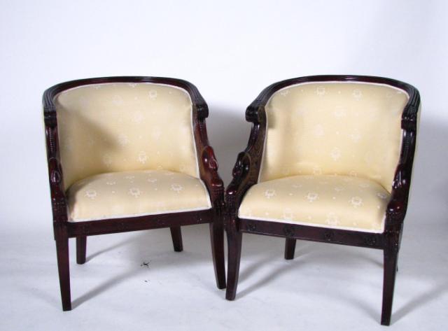 Appraisal: Pair of wood framed upholstered chairs with carved style swan