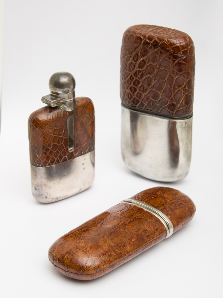 Appraisal: ENGLISH SILVER-MOUNTED AND ALLIGATOR SKIN-CLAD GLASS SMALL FLASK C S