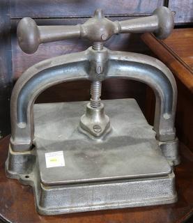 Appraisal: Continental cast iron book press Continental cast iron book press