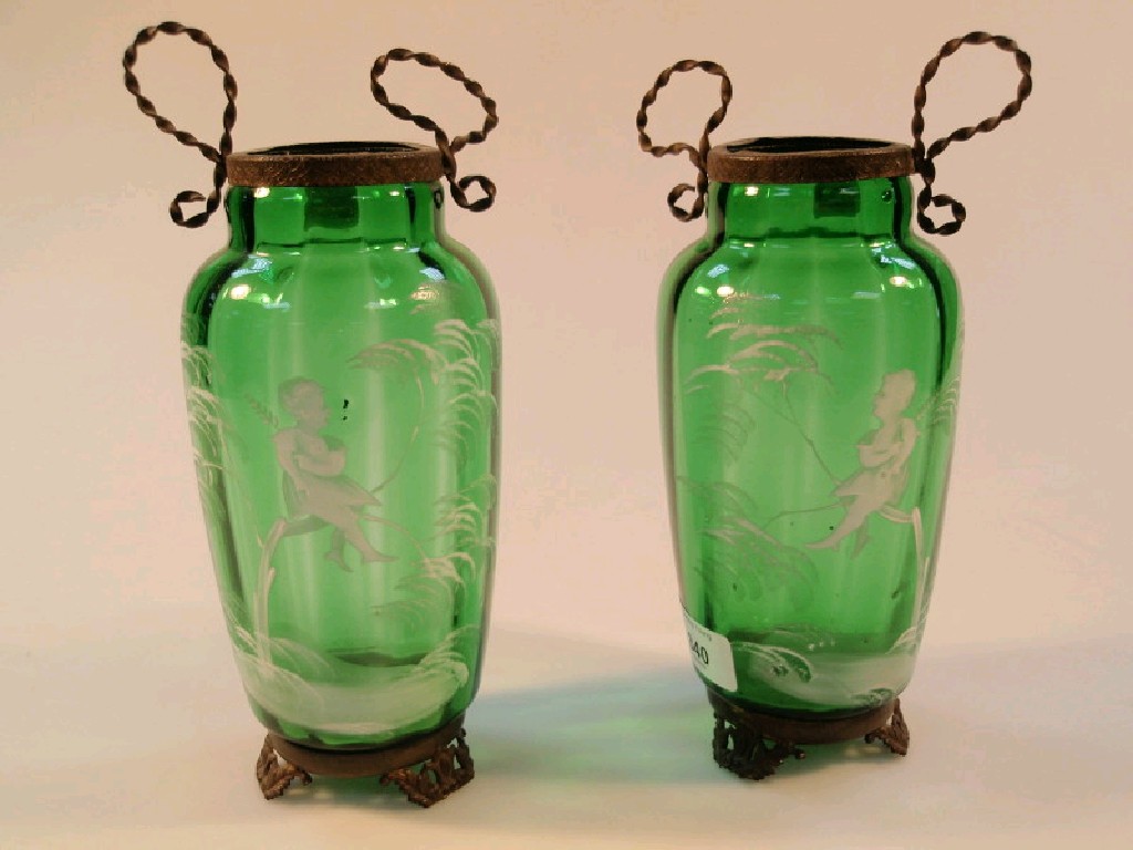 Appraisal: A pair of late Victorian green glass vases with Mary