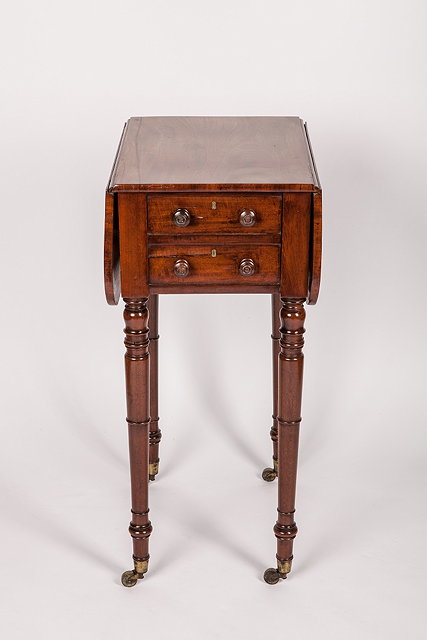 Appraisal: A TH CENTURY MAHOGANY DROP-LEAF WORK TABLE fitted two end