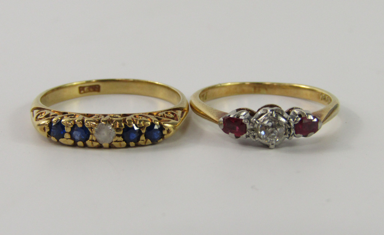 Appraisal: An ct gold ruby and diamond three stone ring size