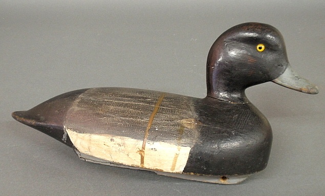 Appraisal: - Frank Coombs bluebill drake decoy with yellow glass eyes