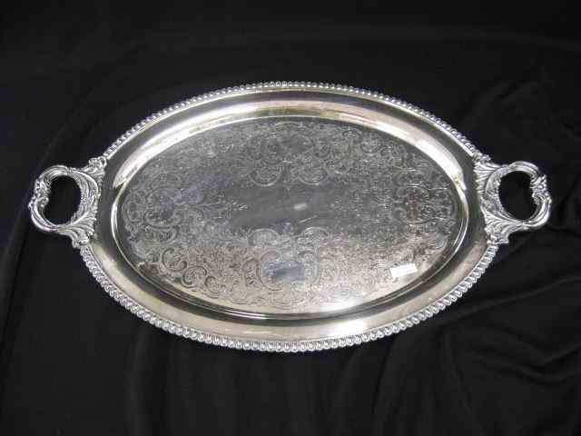 Appraisal: English Silverplate Serving Tray engraveddesigns gadroon border handled oval ''