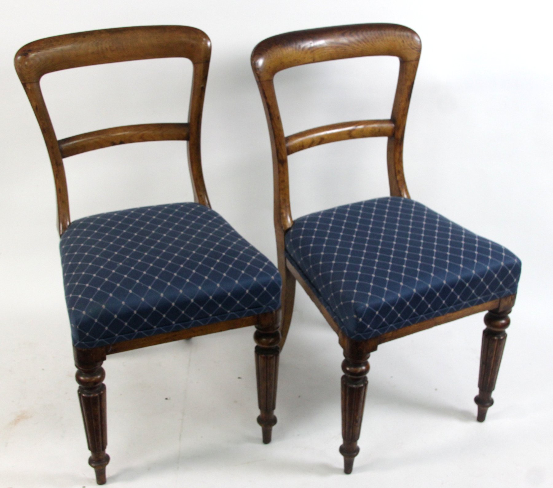 Appraisal: Four Victorian mahogany dining chairs with reeded legs