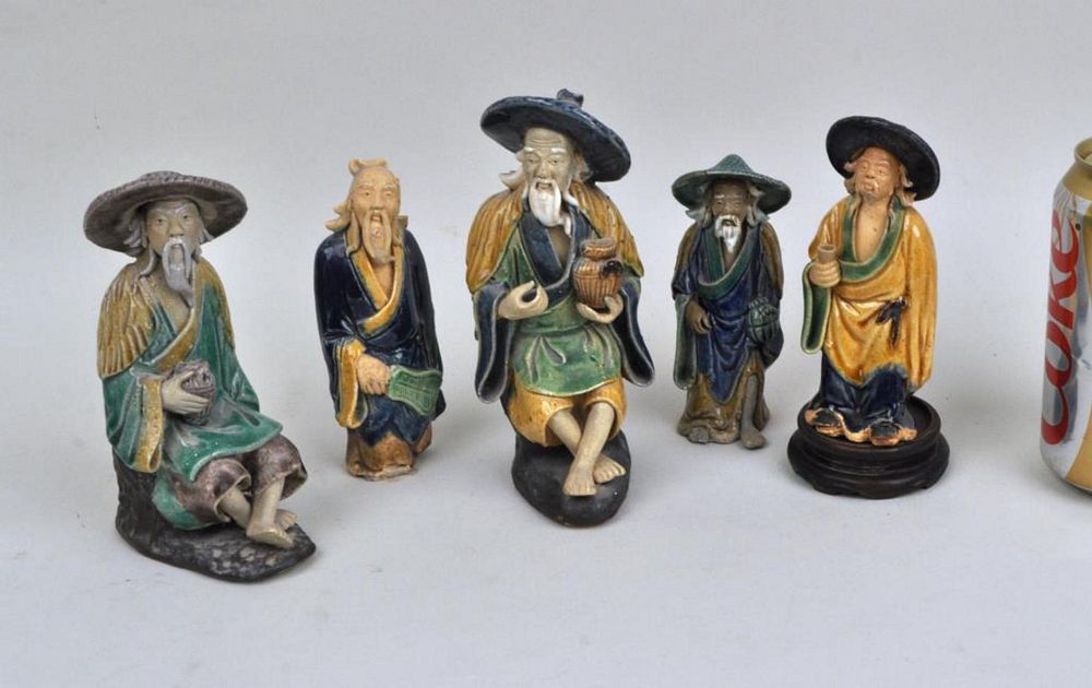 Appraisal: Group Five Chinese Polychrome Mud Figures comprising two seated figures