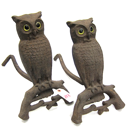 Appraisal: A PAIR OF CAST-IRON OWL ANDIRONS American early th century