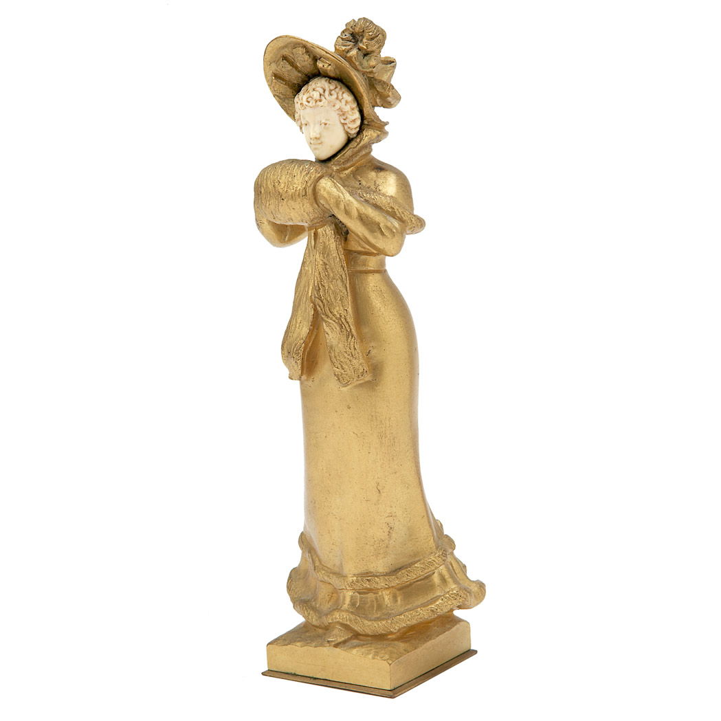 Appraisal: French Gilt-Bronze and Carved Ivory Figure of a Woman After