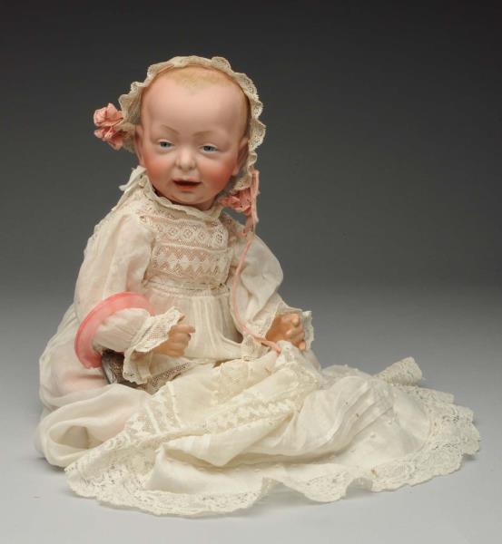 Appraisal: Smiling K R Character Baby Doll German bisque socket head