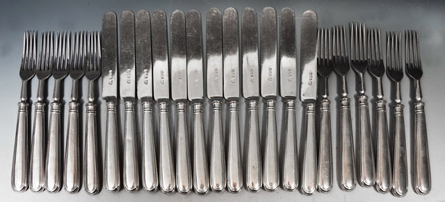 Appraisal: A SUITE OF TWELVE FRUIT KNIVES and eleven fruit forks