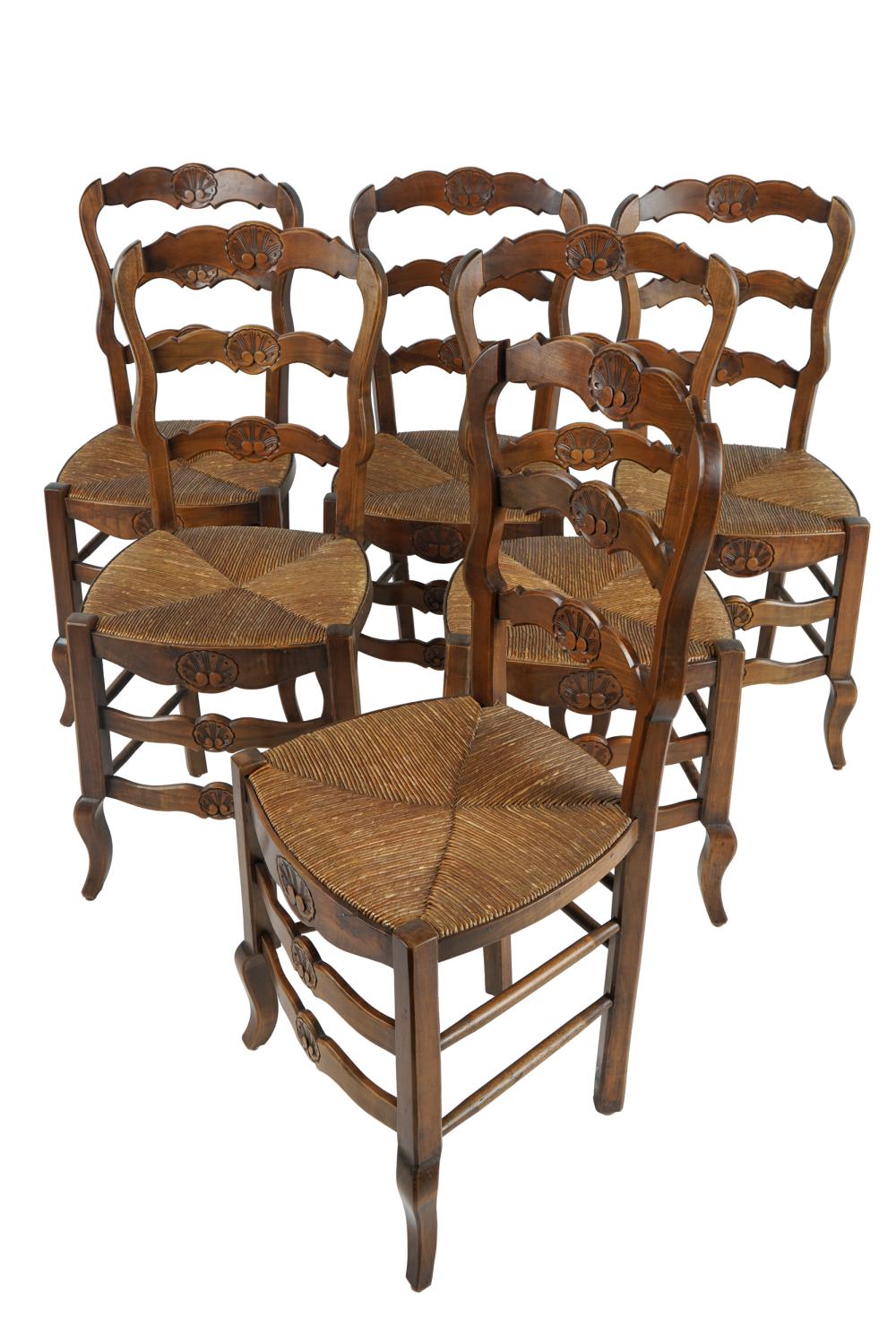 Appraisal: SIX FRENCH PROVINCIAL STYLE DINING CHAIRSwith ladder backs and rush