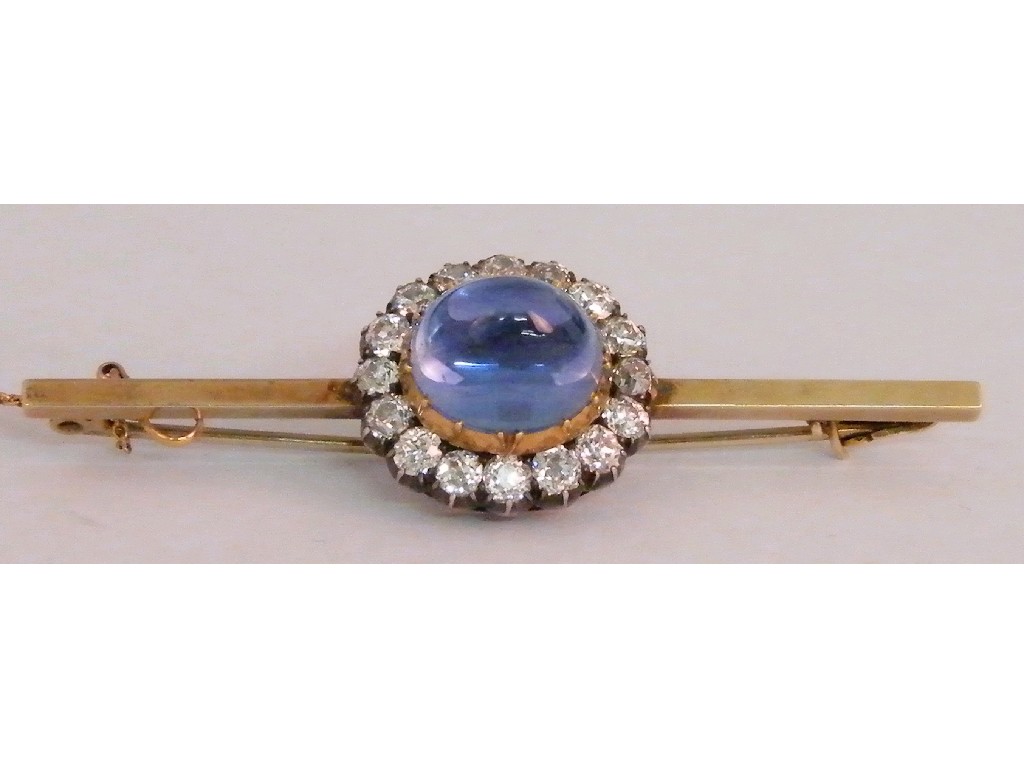 Appraisal: Fine Salam 'sugarloaf' cabouchon sapphire and diamond cluster bar brooch