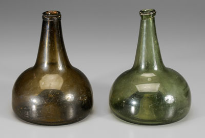 Appraisal: Two th century glass bottles both club shape with high