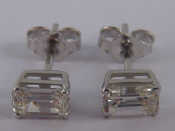 Appraisal: A pair of carat white gold diamond stud earrings the