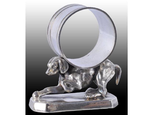 Appraisal: Crouched Hunting Dog Figural Napkin Ring Description Hunting dog balances