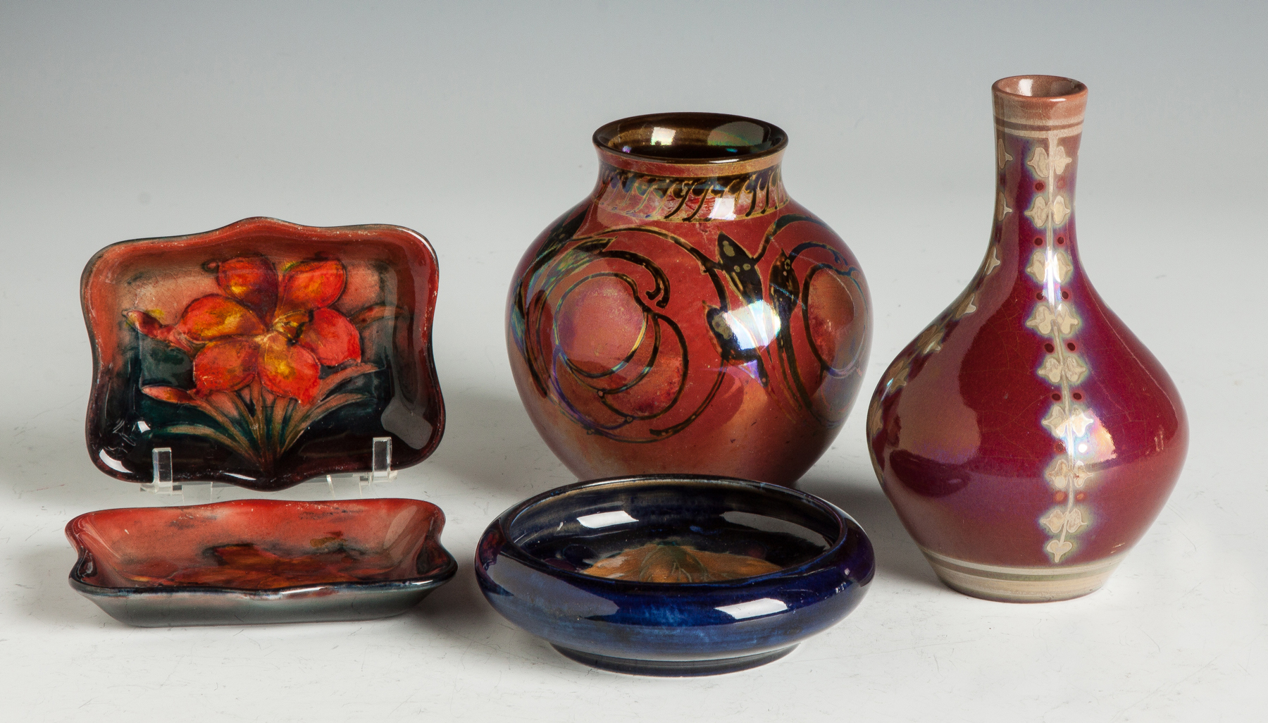 Appraisal: Five Moorcroft Pilkington Pieces Two Moorcroft flamb pin trays with