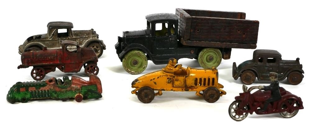 Appraisal: ANTIQUE CAST IRON VEHICLE TOYSLot of seven cast iron toys