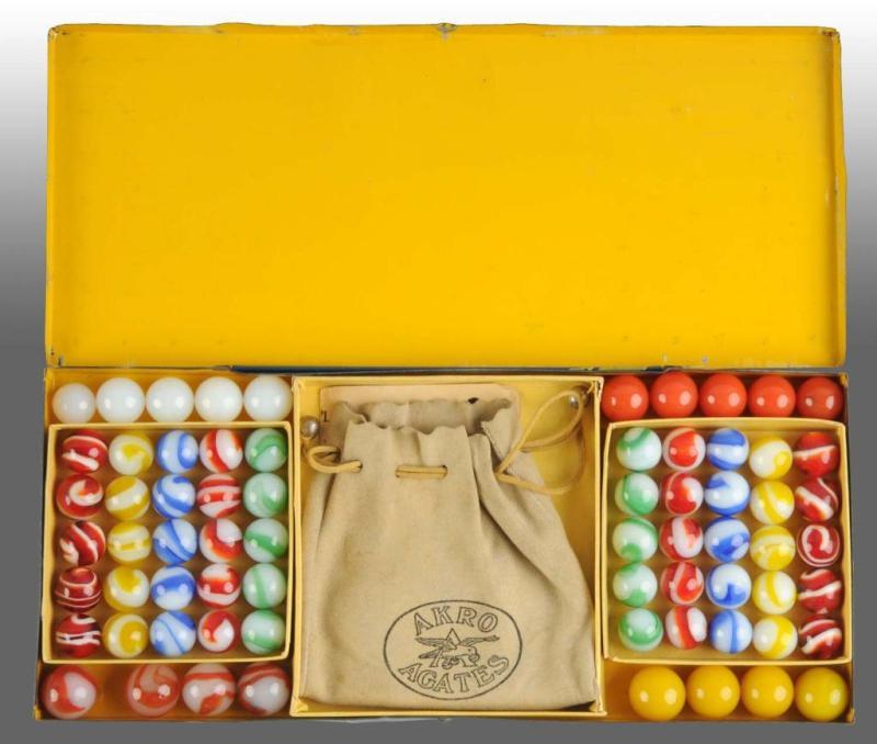 Appraisal: Akro Tin Box Marble Set Description count with original bag