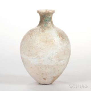 Appraisal: Beige-glazed Pottery Jar Beige-glazed Pottery Jar Persia oval the sides