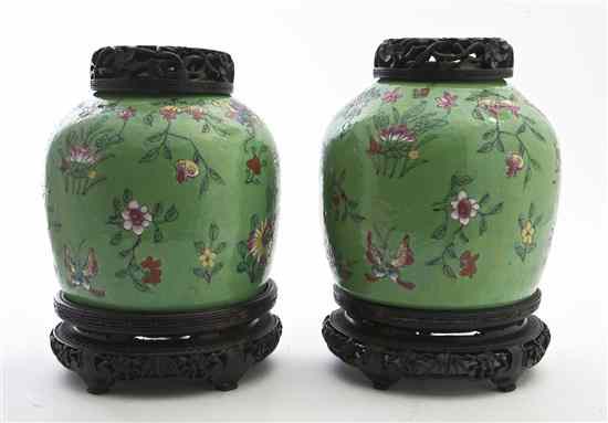 Appraisal: A Pair of Chinese Enameled Porcelain Jars having polychrome floral