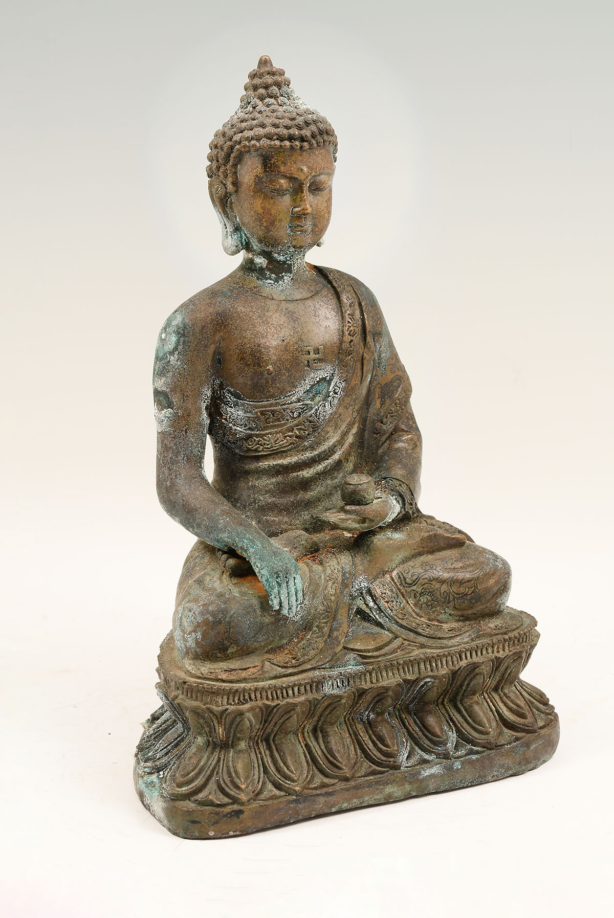 Appraisal: CAST BRONZE TIBETAN BUDDHA Chinese Tibetan Buddha in a meditative