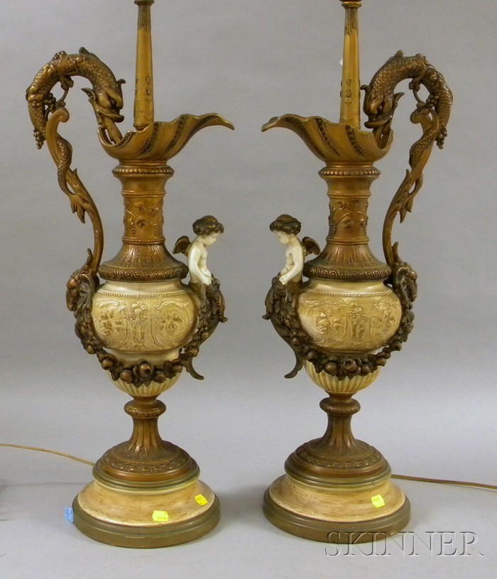 Appraisal: Pair of Neoclassical Ewer-shaped Lamps fish handled decorated with cupid