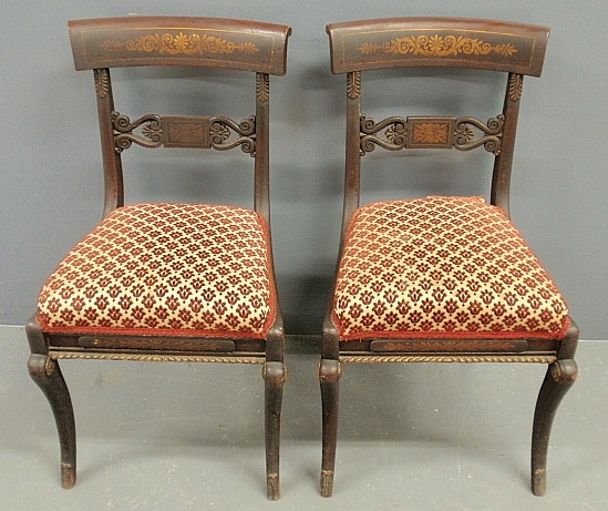 Appraisal: - Pair of Philadelphia mahogany saber-leg side chairs c with