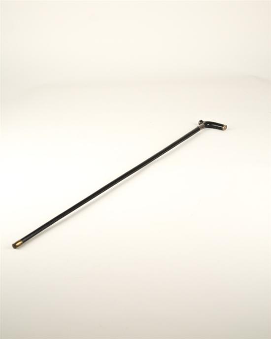 Appraisal: An Ebony Wood and English Sterling Walking Stick the slender