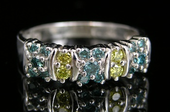 Appraisal: A Blue and Yellow Diamond Band k white gold band