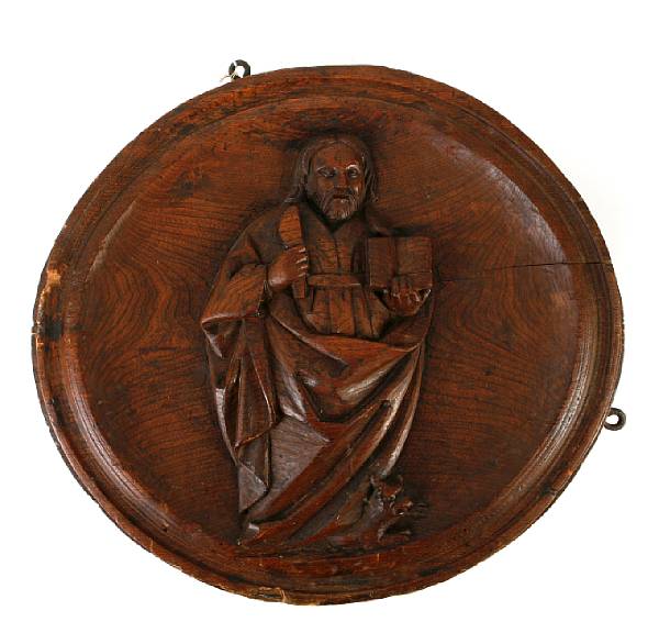 Appraisal: A Continental carved walnut circular plaque diameter in