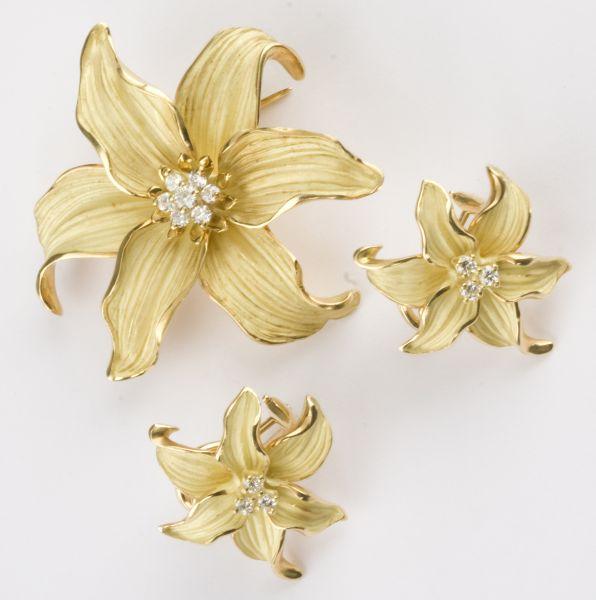 Appraisal: KT Gold and Diamond Flower Brooch and Earrings six petal