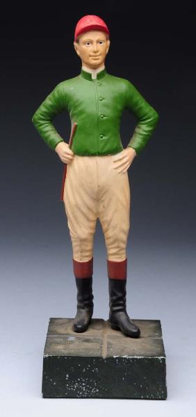 Appraisal: Pot Metal Standing Jockey Doorstop Depicts jockey dressed in full