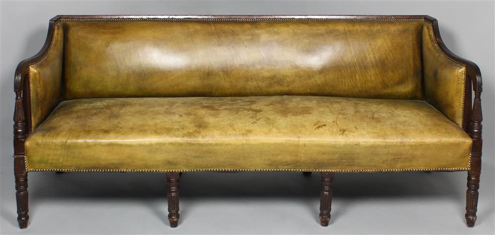 Appraisal: ENGLISH SHERATON MAHOGANY AND LEATHER UPHOLSTERED SOFA of typical form