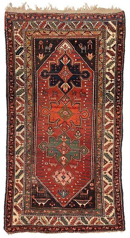 Appraisal: Karabagh Carpet three central medallions red field brown spandrels with