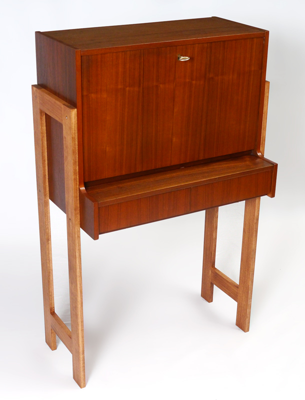 Appraisal: MID CENTURY MODERN TEAK SECRETARY Drop front secretary interior with