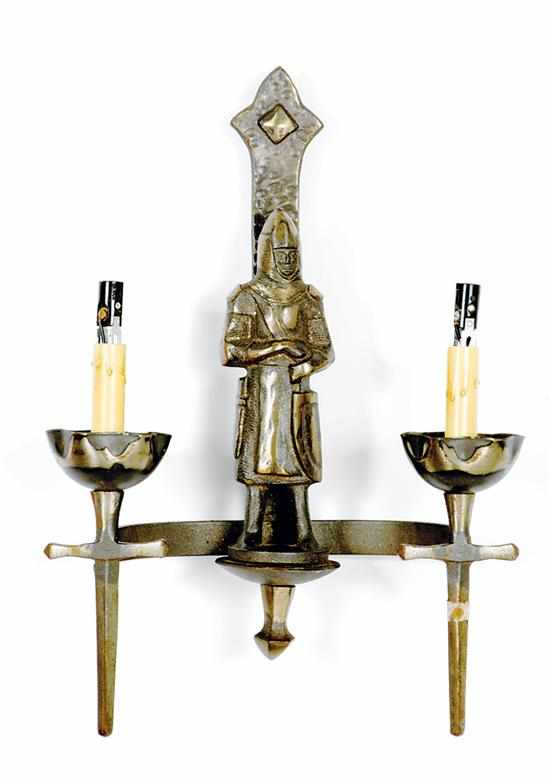 Appraisal: Continental cast-metal sconce wrought mount centered by figure of knight