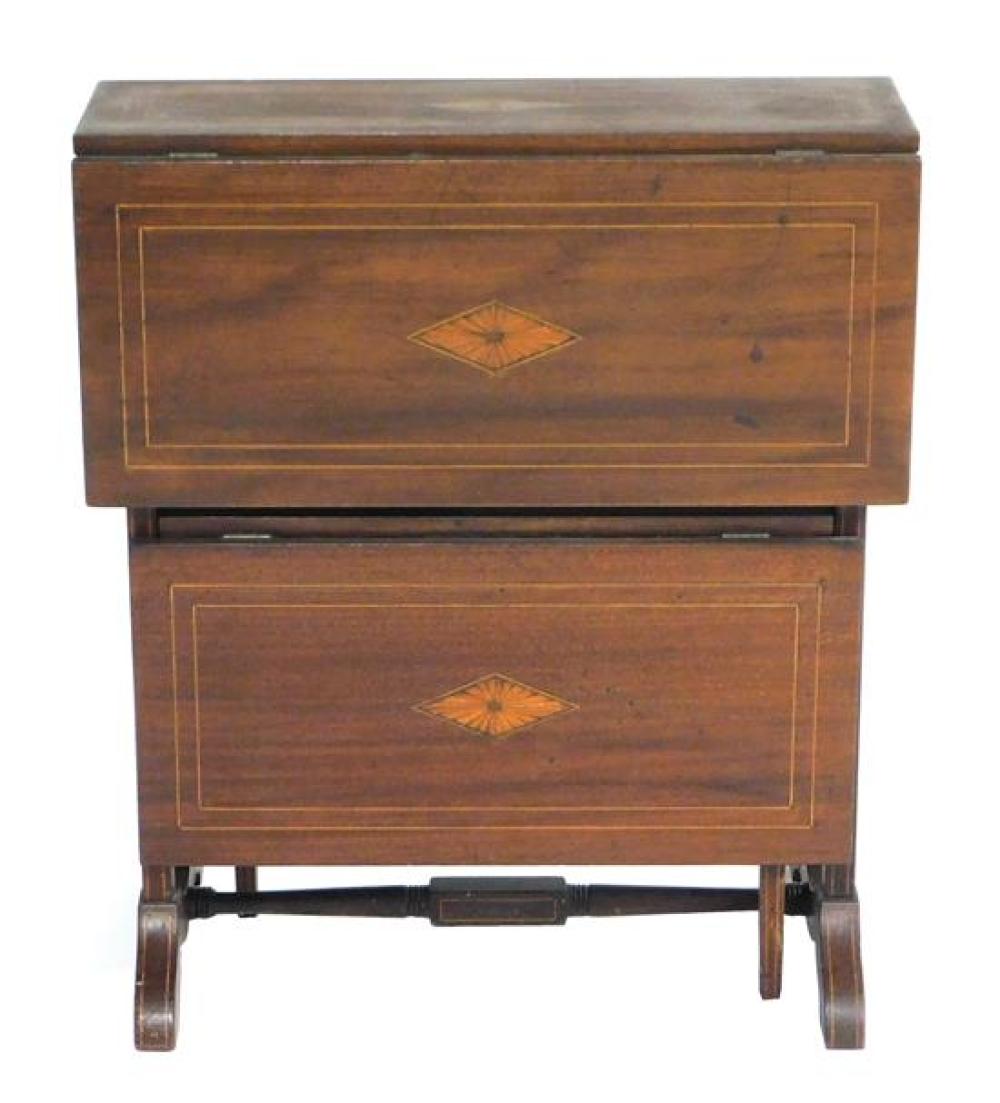 Appraisal: Mahogany and mahogany veneer two-tier drop-leaf stand c with decorative