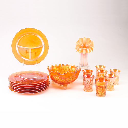 Appraisal: Carnival glass group in Marigold color including eight sectioned dinner