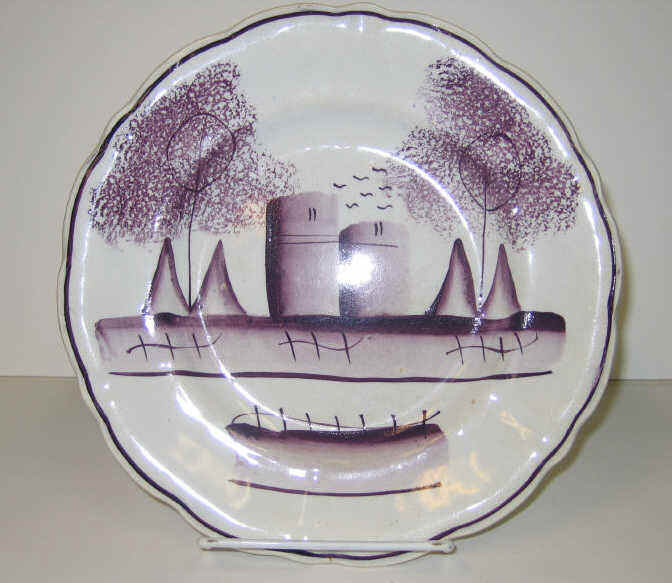 Appraisal: ENGLISH SPATTERWARE A purple spatter plate in the castle pattern