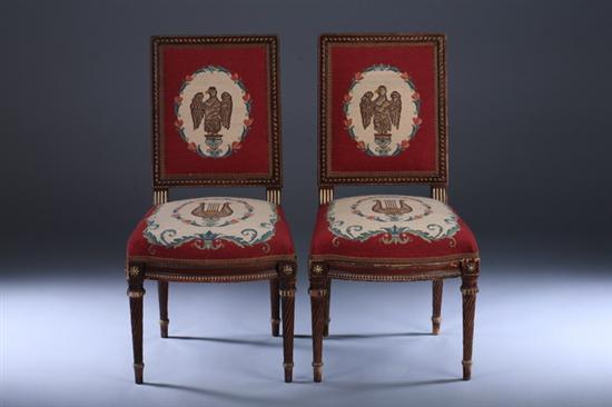 Appraisal: PAIR LOUIS XVI-STYLE CARVED AND GILT-DECORATED NEEDLEPOINT- UPHOLSTERED SIDE CHAIRS